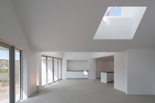 The Element House also features eight balconies, two of which (seen left) border the living area.