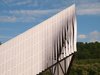 The fabric strips can be twisted to form a striated gradient pattern, while also adding transparency to the facade. Photo of A Modular, Translucent Pavilion With a Fabric Facade modern home
