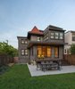 When Justin Sullivan and Christine Ju stumbled upon this house in Cleveland Park neighborhood of Washington, DC, it was in clear need of an update. "It only had one bathroom, a kitchen that hadn't been touched since the 60s, and a small backyard that had become overgrown with weeds and had a rusty chain link fence," Sullivan says. It was originally 1,800 square feet, but the couple expanded it to 2,400 with the addition of a basement. Photo of A Smart Modern Remodel of a Traditional DC House modern home