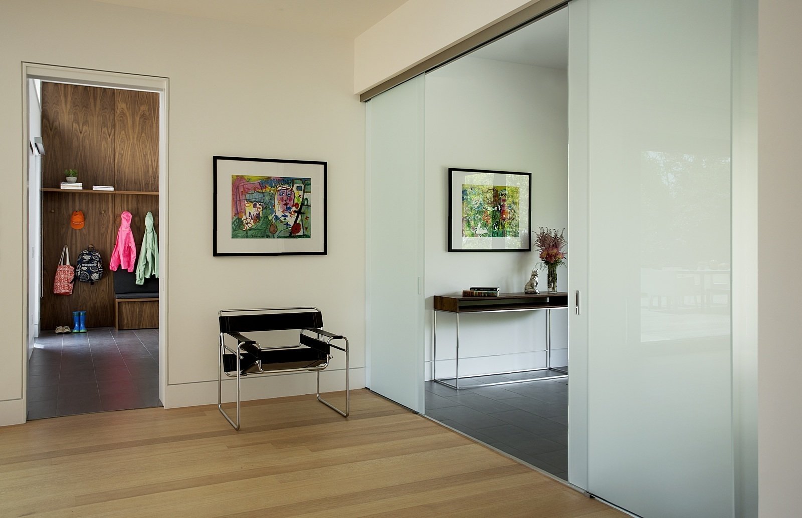 The 4,400-square-foot residence is designed for aging in place. A ground-floor bedroom suite enables extended stays from grandparents. Low- and no-VOC finishes create healthy indoor air quality.