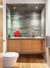 Severns put in a glass-block wall to separate the office from the guest bedroom, and created brand-new bathrooms. Photo 3 of Parker Willis House modern home