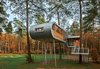 Treehouse by Baumraum, Belgium
Andreas Wenning's firm Baumraum counts over 40 houses, sited in both rural and urban locales, in its portfolio. To reduce impact at this forested site, Baumraum prefabricated a treehouse and craned it atop 19 steel columns, arranging it so that the surrounding trees’ roots wouldn’t be harmed. Photo of Sourcing Guide for Modern Prefab Companies in Europe modern home