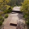 Modern home with Outdoor, Wood Patio, Porch, Deck, and Large Patio, Porch, Deck. A custom lid for the hot tub doubles as a deck that can travel all the way to the outdoor shower on a track. Photo of A Spa-Like Patio with Stunning Views Cascades Down a Los Angeles Hillside