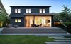 Modern home with Back Yard, Grass, Large Patio, Porch, Deck, Exterior, House, and Wood Siding Material. “The backyard, which was kind of the focus of the project, was overgrown and quite disconnected from the house itself,” said architect Nigel Parish. The glass doors of the addition open onto a patio and lawn where the kids can play. Photo 16 of Trotman Residence