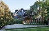 Modern home with Exterior, House Building Type, Shingles Roof Material, and Wood Siding Material. The whole exterior of the home, including the trim, is painted Wrought Iron by Benjamin Moore for a monochromic, quiet look. Photo of Modern Spaces in the Pacific Northwest