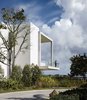 Modern home with Outdoor, Concrete Patio, Porch, Deck, Shrubs, and Trees. Filmmaker-turned-designer Alejandro Landes chose materials such as concrete and stone for their raw appeal, allowing nature to take center stage—while a series of balconies and decks offer myriad ways to enjoy the view. Photo of Casa Bahia