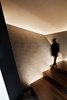 Walnut stairs are side-lit by LEDs. Photo 6 of SRK modern home