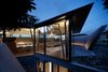 The architects describe the upstairs views as transporting the residents to a rocky mountain. Photo 8 of SRK modern home