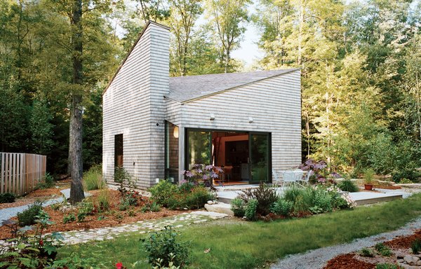 An artist by trade, and gardener by passion, Allison Paschke commissioned Providence-based architecture firm 3SIXØ to build a modest cottage that would allow her to reconnect with nature. She landscaped the home’s lush gardens herself.