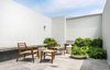 Modern home with Outdoor, Rooftop, Concrete Patio, Porch, Deck, and Planters Patio, Porch, Deck. The roof decks, restaurant, and public spaces all feature furnitute designed by La Metropolitana, a design collective that produces their furniture in a workshop in nearby Obrera. These pieces combine CNC-cut wood with cord woven using a Danish technique the designers learn by watching YouTube videos. Founded in 2008, the group is working to develop small infrastructures in different cities, each operating independently with local materials, local workers, and local suppliers. Photo 6 of Hotel Carlota