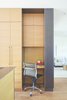 The rear unit’s kitchen has storage space and a desk made of rift oak. Photo of A San Francisco Renovation Creates Two Apartments from One modern home