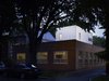 Appearing almost as a glowing container stack, the corrugated aluminum addition relates to the low-lying structure’s commercial past. Not that owners Dave and Jeannette Jordano were saddled with rehab and remediation. The previous occupant, architecture firm Morgante Wilson, outgrew the 50-foot-by-50-foot footprint but left the space in fine condition. Photo of Ravenswood Residence modern home