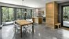 The firm's first home model for the development is dubbed Spahaus. Meant as vacation homes, the site's 21 cabins are designed to take advantage of the area's natural setting with large windows that overlook the forest. Photo 2 of Spahaus modern home