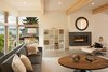 “The owner is currently adjusting and curating the furniture from their large midcentury home in Connecticut to fit with their new Pacific Northwest home,” Weber noted. Double paned, trickle-vent windows show off the views during the day, while recessed lights by Sea Gull Lighting illuminate the home at night. Photo 4 of Cedar Douglas Residence modern home