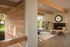 Benjamin Moore’s “White Dove,” painted on the interior walls, brightens the varying shades of the woods. Photo 5 of Cedar Douglas Residence modern home