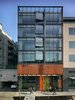 Modern home with Exterior and Apartment. In Seattle's rapidly developing South Lake Union neighborhood, the Art Stable is a classic example of urban infill. Built on the site of a former horse stable, the seven-story mixed-use building carries its history into the future with highly adaptable live/work units. Photo of Olson Kundig Houses