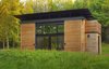 Modern home with Exterior, Wood Siding Material, Cabin Building Type, and Prefab Building Type. In September 2009, Bill and Daniel Yudchitz bought a 2.78-acre lot that had water access to Lake Superior’s Chequamegon Bay. Many of the properties they looked at required a larger minimum building footprint than they desired; their cabin needed to be small to reduce its environmental impact.
Photo of Modern Homes That Are 500 Square Feet or Less