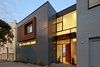 Modern home with Exterior, House Building Type, Metal Siding Material, and Wood Siding Material. Studio VARA explains “the project’s success lies in the judicious use of carefully executed moments," such as wood screen that recreates the privacy of now-trimmed tree branches. Studio VARA also cites a "subtle palette of ‘warm’ mixed with ‘cool’ that recurs in both tone and materials: wood juxtaposed with glass, metal against stone.” Photo of Noe Residence