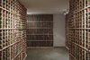 Modern home with Storage Room and Shelves Storage Type. One of the biggest talking points of the home is its cork-floored wine cellar. Originally the garage, it was converted to accommodate the homeowner’s sprawling collection. The thermal mass of the surrounding earth keeps the space cool. Photo 8 of Noe Residence