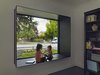 Modern home with Windows, Picture Window Type, and Metal. The original home was preserved and renovated. In the front bedroom, a small window was replaced with a large painted-steel window seat, a favorite of the residents' grandchildren. Photo 5 of 1950s Ranch