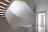 The third floor houses the children’s bedrooms, with curtains by The Shade Store. Photo 5 of White Oak modern home