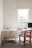 Modern home with Office, Study Room Type, Chair, Desk, Lamps, and Carpet Floor. The study has a fun, playful atmosphere thanks to a red Square Dining Chair from MAP, a Tempo wall clock by Naoto Fukasawa for Magis, and house sculpture also from David Band. Photo 7 of Seclusion