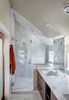 Modern home with Bath Room, Enclosed Shower, Marble Wall, Recessed Lighting, Ceiling Lighting, Marble Counter, and Undermount Sink. Carrara marble was used in the shower and on the countertops. The fixtures are from Hansgrohe. Photo 6 of Highlands House