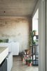 The residents included an original set of stools and shelving from the 2015 Crosby Studios collection to show off their house plants. Photo 4 of Soviet Intelligentsia modern home