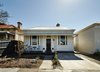 The original facade has been maintained. Photo 9 of Cut Cut Paw Paw modern home