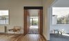 “Instead of extending the new living area from the existing house, we decided to build a stand-alone structure off the front house and connect the two spaces with a central passageway,” Ong says. This made the back of the home distinctive from the Edwardian front. Recyled brick was used to create the connecting hallway. Photo 8 of Breeze modern home