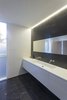 Vola fixtures are used in the bathroom. Photo 8 of Villa R modern home