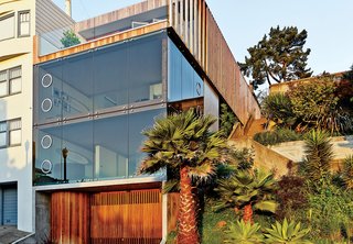 For a San Francisco couple living on a hill overlooking the Mission District in San Francisco, glass walls were a must. Indoor louvers allow the residents to frame their view of the city, much like the aperture on a camera.