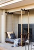 Hollis designed the custom outdoor bed, which is suspended by ropes. "We hope that visitors come away relaxed and refreshed and have the feeling they had the one-of-kind experience of the valley," she says. Photo of A Serene Hotel in Carmel, California modern home