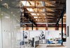 Modern home with Office, Desk, Rug Floor, and Chair. Eames Office. Photo of Eames Molded Chairs