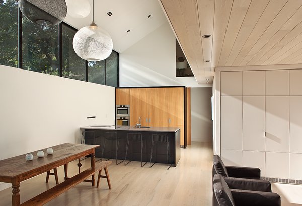 Marc Lithgow custom designed the American oak kitchen cabinets. The floors, and the ceiling above the lounge, are whitened maple.