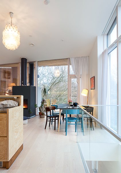 The Carlos Scarpa chandelier and dining chairs by Werner West are both family heirlooms; the table is another custom design by Salminen.