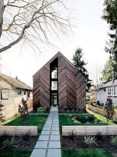 In Seattle’s Greenwood neighborhood, architect Tiffany Bowie built an efficient house for her father, Dave, a retired engineer. A prototype system by Kirio monitors the home’s energy use. Shou sugi ban cladding in a herringbone pattern provides a striking backdrop.