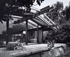 The architects maintained the midcentury post-and-beam construction and Japanese-inspired details of the original building, while brightening and expanding the interior living spaces. Photo 11 of Modernist Gem Revival modern home