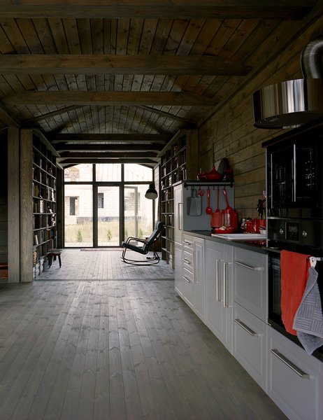 The interior was designed with as few partitions as possible; floor-to-ceiling glazing by Russian Glass Company underscores the sense of openness.