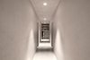 Modern home with Hallway and Concrete Floor. The minimal interior lends a modern feel to the chalet. Photo 9 of La Pedevilla