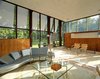 Since the large windows had gone through some harsh wear and tear over the years, Ferris decided to replace the old window panels with new double-paned windows while following Johnson’s original drawings. Ferris personally knew Johnson and made sure to stick to his vision when restoring the house. Photo 7 of Wiley House modern home