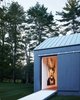 Take a peek into the edge of the 19th-century barn that Ferris transformed into a gallery. The traditional barn structure was retained while the interior was turned into a minimal and open canvas for the current homeowner’s art collection. It’ll be interesting to see how the next owner utilizes the space. Photo 6 of Wiley House modern home