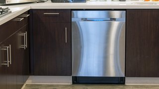 Samsung’s WaterWall technology creates a wall of water that glides over dishes, but users can also customize wash settings based on different zones of the dishwasher to target specific items. The stainless-steel door features an LED display, and it remains in the realm of quieter models at 44 decibels. 