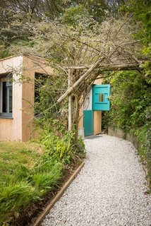 The secluded Libertine Cottage near Perranporth Beach was once an 18th-century pigsty before its owner, an ex-fashion buyer, turned it into a special hideaway that's filled with industrial furnishings and colors that pop. 