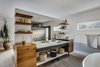Modern home with Bath Room, Medium Hardwood Floor, Undermount Sink, and Freestanding Tub. Even before Juilland started on the project, the homeowners tapped Ben Dagitz of DagitzFurniture to make a few items for the home. This included the Photo 6 of Frischkorn Ranch