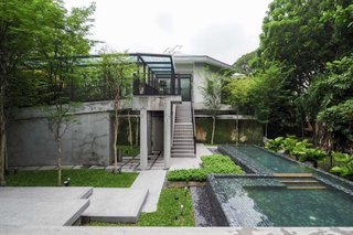 Designed by the Singapore-based multi-disciplinary studio FARM, Lloyd’s Inn is a bold exploration of light, texture, and space, where a minimalist approach allows for a seamless merging of both city and nature. 