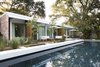 Modern home with Outdoor, Large Pools, Tubs, Shower, Swimming Pools, Tubs, Shower, Large Patio, Porch, Deck, and Wood Patio, Porch, Deck. To revive the original architects’ vision, studioWTA restored a four-foot roof overhang above a wall of La Cantina sliders. The shade helps limit solar gain, while a pool by Evans + Lighter Landscape Architecture provides respite on sweltering summer days. Photo 7 of Emerald Street Residence