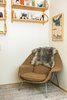 In daughter Elliot’s room, a vintage Womb chair by Eero Saarinen is situated below Alvar Aalto 112 shelving scored on eBay. Photo 8 of The Romano-Ferrer Residence modern home
