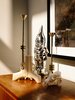 Modern home with Bedroom and Night Stands. A pair of Tom Dixon Cog candle holders and a 3Guns vase by Suck UK are assembled atop a vintage teak sideboard. Photo 8 of Conrad Residence