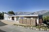 Modern home with Exterior, Shed RoofLine, and Flat RoofLine. Solar panels are affixed to the garage roof, which is angled to maximize exposure. Photo 4 of The Krohn/Koza Residence